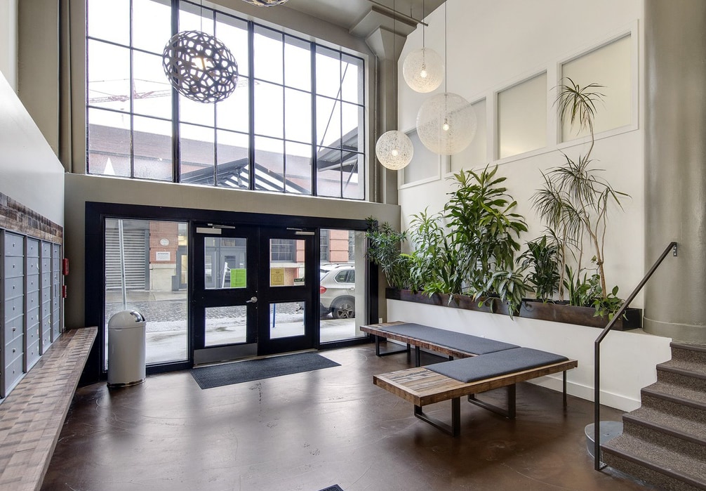 Modern lobby with high ceilings and large windows